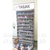 Фотография сигаретного шкафа  с десятью синхронными шторками у клиента на объекте