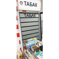 Фото примера табачного шкафа с установкой  светового лайтбокса с регулировкой угла наклона
