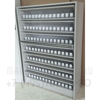 Сигаретный шкаф с синхронной системой шторок с семью уровнями полок в открытом виде