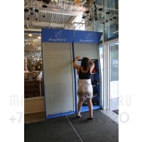 Фотография примера  использования пристенного стеллажа с рольставнями