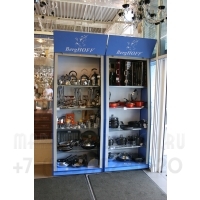 Фото стеллажа с рольставнями для магазина