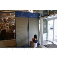 Фото двухстороннего стеллажа с рольставнями